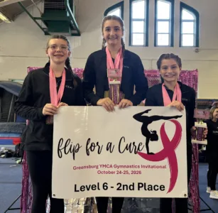 Warren YMCA Powerhouse gymnasts at their peak